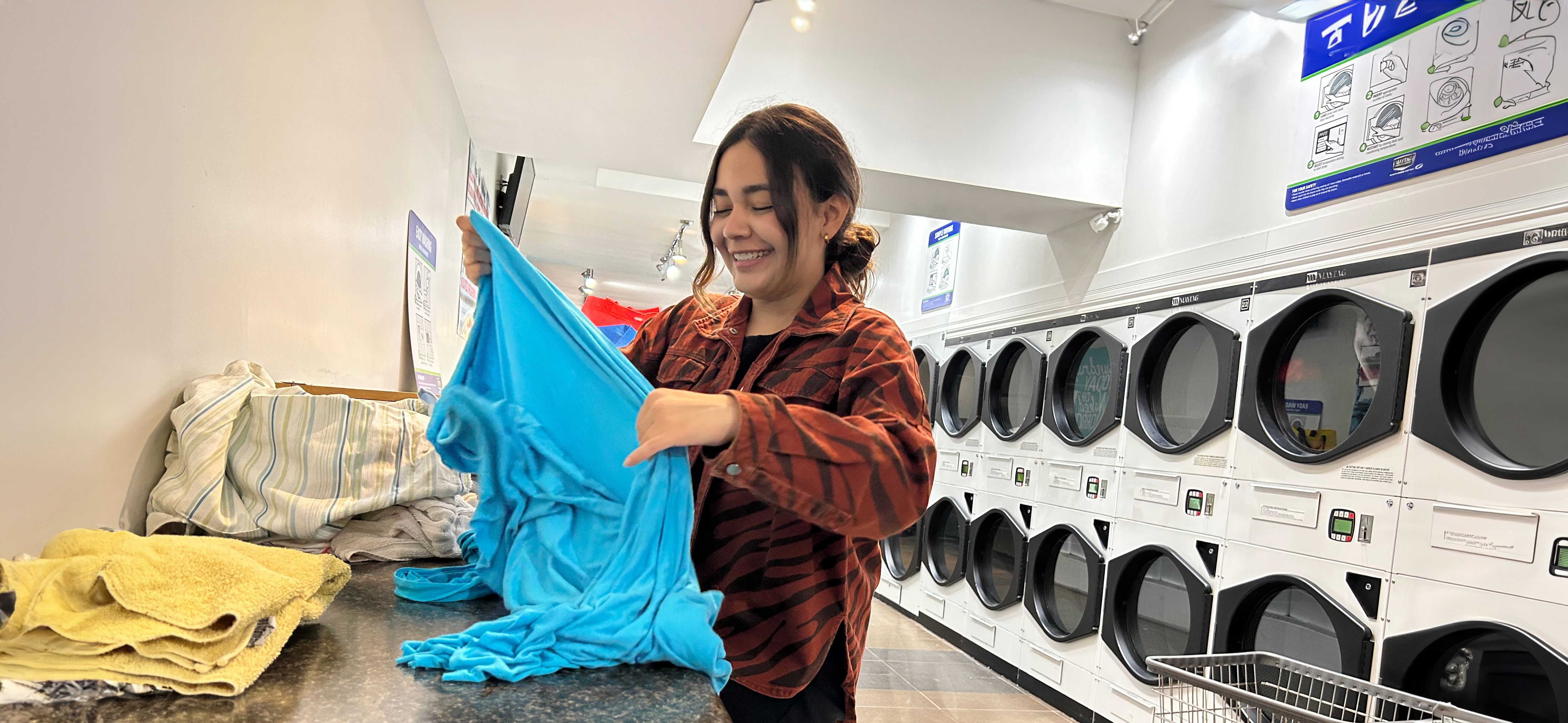 woman folding laundry